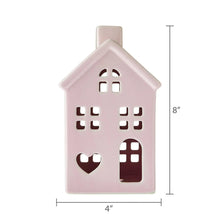 Pink ceramic house tabletop decoration, 4 in wide and 8 in tall