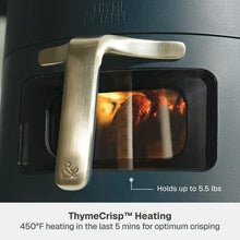 Atlantic Blue air fryer with open window, gold handle, and food cooking inside