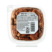Praline pecans Nutrition Facts panel on back of clear plastic container