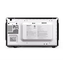 Microwave oven bottom view with ventilation grille and product label