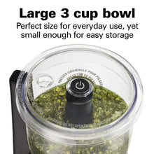 Clear 3-cup bowl on black chopper base with stainless blade and lid