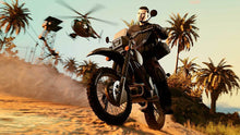Motorcycle action scene with rider on a bike outdoors with palm trees at sunset