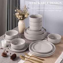 Gray stoneware stackable plates and bowls set arranged for storage
