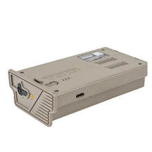 Lithium battery cartridge underside with side connectors and vented grip