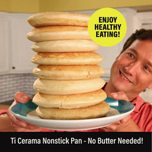 Double-sided mini pancake maker, shown with a stack of pancakes on a plate