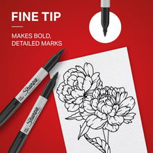 Black fine-point permanent marker drawing on paper with outlined flower design.