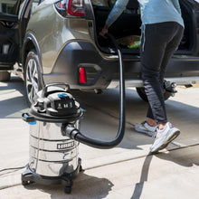 Hart wet/dry vacuum with hose and nozzle for cleaning a car interior