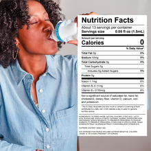 Gray water bottle with blue flavor cartridge shown with a nutrition facts panel