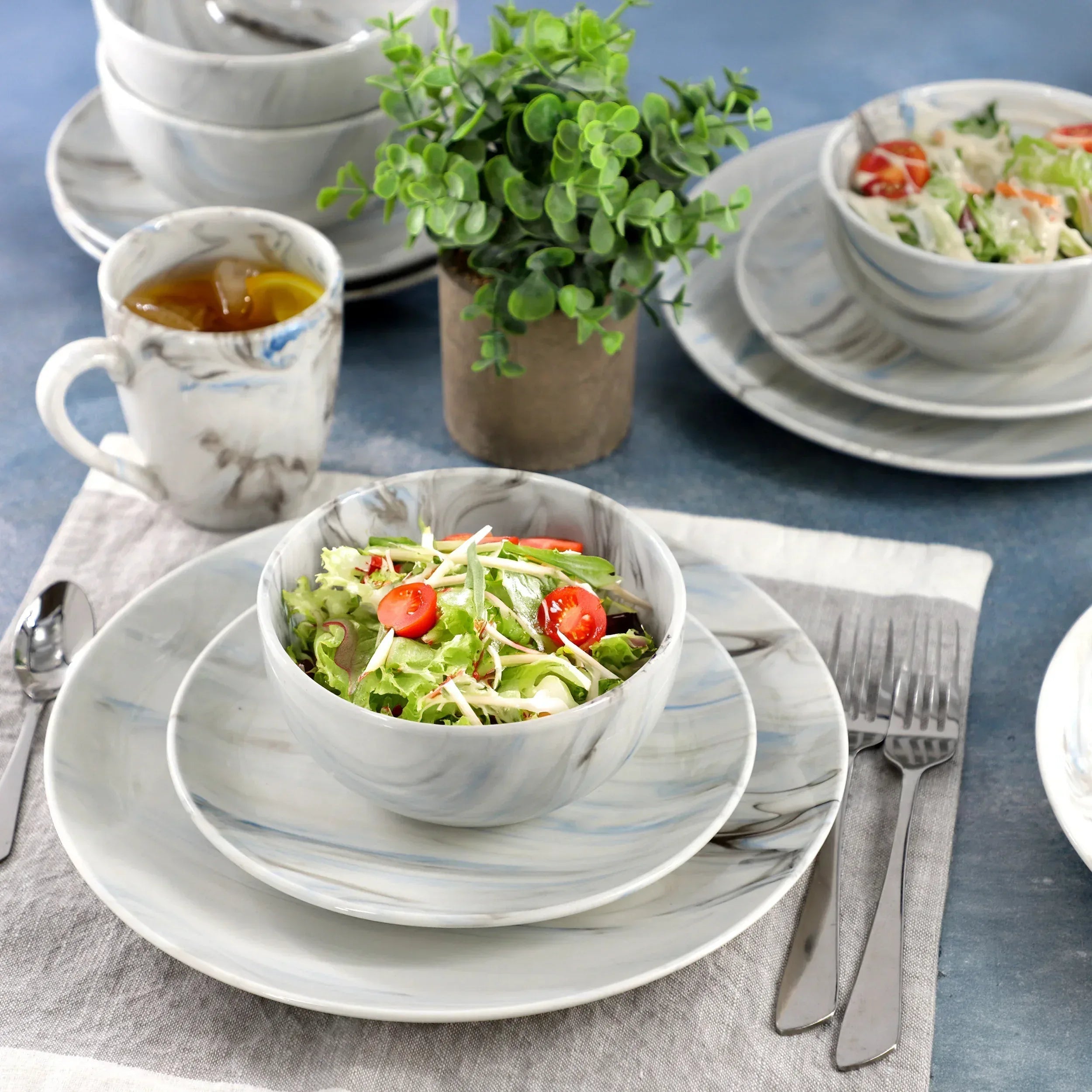Elama Fine Marble 16 Piece Porcelain Dinnerware Set in Blue and Gray, Service for 4