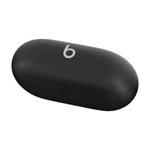 Dark wireless charging case with b logo on top, closed lid view