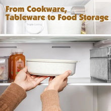 White speckled pot being placed into a kitchen refrigerator shelf