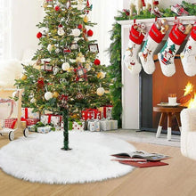 White faux fur Christmas tree skirt, circular and thick with shag pile around Christmas tree