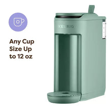 Keurig K-Mini Mate pod coffee maker in Glamping Green, side view with open pod area