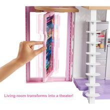 Dollhouse playset side view with a sliding panel being opened by a hand