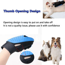Blue thumb-strap rubber pet brush with soft bristles for easy gripping