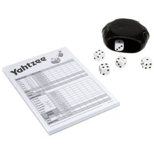 Yahtzee dice shaker with white dice and a printed score sheet