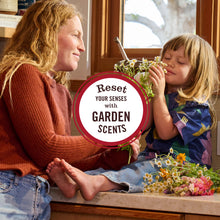 Garden scents reset-your-senses graphic over a family scene