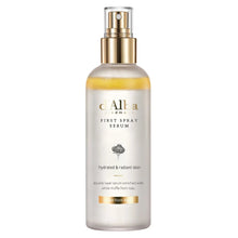 d'Alba First Spray Serum bottle with gold pump, amber liquid in frosted tube