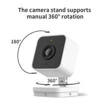 Indoor security camera on white stand with black lens module and 360° rotation