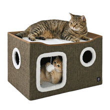 Member’s Mark brown cat condo with two cats, plush-lined openings and hanging toy