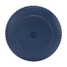 Blue melamine dinner plate underside with concentric ring texture