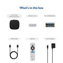 Streaming box contents: black device, remote, HDMI cable, power adapter, batteries