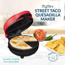 Red and black street taco quesadilla maker with open cooking plates and tortillas