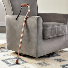 Bronze offset aluminum cane with curved handle and black wrist strap