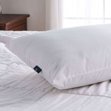 White cooling pillow with textured surface and Serta logo patch