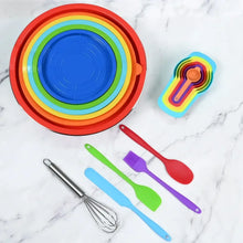Nested mixing bowls with rainbow lids and assorted silicone kitchen tools