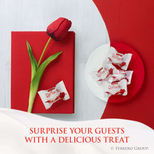 Raffaello individually wrapped candies placed with gift card and tulip
