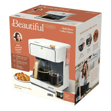Multi-Brew coffee maker retail box with photo of white machine and feature icons