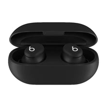 Dark wireless earbuds inside open charging case, showing left and right earbuds