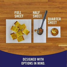 White paper towel squares laid out on wood board: full, half, and quarter sheets