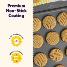 Gray non-stick baking sheet with textured cookie-baking surface detail