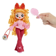 Blossom fashion doll with red bow, blonde hair, pink ruffled top, maroon pants, holding pink brush