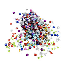Pile of assorted multicolor gem beads with star, heart, and square shapes