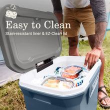 Blue hard cooler chest with open lid, food containers and bottles in interior.