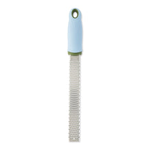 Blue handheld box grater with stainless shredding surface and loop handle