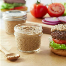 Mini quilted mason jars with tan spread, clear glass with metal lids and bands