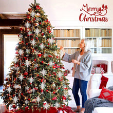 Christmas tree decorated with white acrylic snowflake drop ornaments on chains