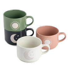 Four ceramic coffee mugs in stackable set, green, navy, white, and pink