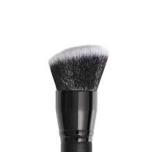 Powder face brush with angled, flat gray bristles and glossy black ferrule