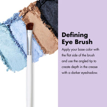 Defining eye brush with angled flat bristles for crease detail.