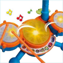Close-up orange and blue drum set with yellow center drum and two side pads