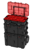 Modular rolling toolbox system with open red drawer inserts and black storage bins