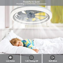 White ceiling fan with LED light ring showing dimmable warm light effect