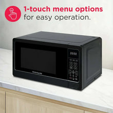 Black countertop microwave oven with front control panel and side keypad