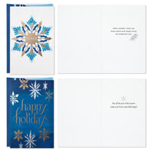 Hallmark Christmas cards shown open, with snowflake covers and printed greetings inside