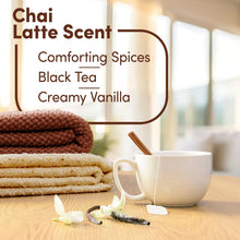 Downy Cozy Chai Latte scent lifestyle scene with folded towels and mug